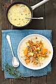 Chanterelle mushroom soup with potatoes, cream and thyme