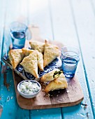 Filo pastries filled with spinach and feta cheese
