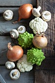 Cauliflower, Romanesco broccoli, onions and mushrooms (seen from above)