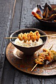 Spicy oriental mussel soup with mussel skewers