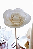 Elegant, white paper rose as festive table decoration