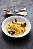 Rosefish and mussels in a saffron curry broth