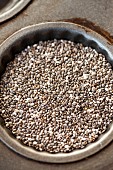 Chia seeds in a baking tin (seen from above)