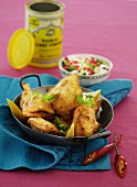 Fried fish with a yoghurt dip (India)