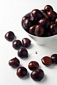 Chestnuts in a bowl and next to it