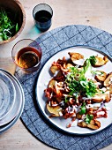 Crispy potatoes with kimchi and spring onions