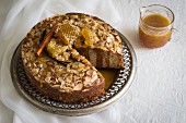 Chai cake with honey, cinnamon and flaked almonds