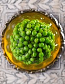 Pea jelly on a metal plate (seen from above)