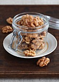 Candied walnuts in a preserving jar