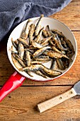 Fried smelts in a pan