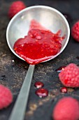 Raspberry jam on a spoon