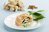 Salmon trout roulade on wild garlic butter