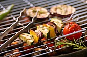 Grilled vegetables skewers on a barbecue
