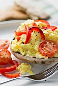 Mushrooms with tomatoes. peppers and scrambled eggs
