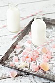 Turkish delight, milk and rose petals on a tray