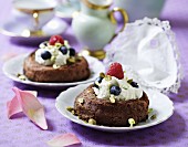 Chocolate cake filled with vanilla ice cream, berries and pistachio nuts