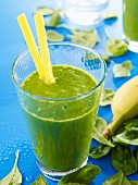 A green smoothie made with spinach and banana