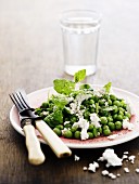 Pea salad with feta cheese and mint