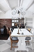 Vintage kitchen with dining area in Scandinavian log cabin