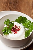Goat's cream cheese with pink pepper and parsley