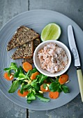 Trout cream served with wholemeal bread and salad