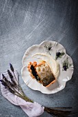 Fried salmon trout fillet on mashed potatoes with fennel, lavender and caviar