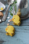 Chick biscuits on a rustic wooden surface