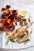 Grilled angelfish fillets with carrot and beetroot chips