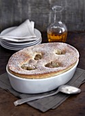 Semolina souffle with apple and icing sugar