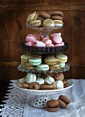 Various macarons on a cake stand