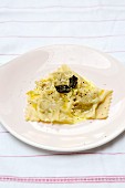 Pumpkin ravioli with butter and Parmesan cheese