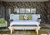 Dark grey floral wallpaper and modern bedroom bench in retro bedroom