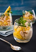 Pineapple desserts with meringue and almonds