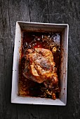 Roast lamb in a roasting tin