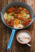 Turkish breakfast with tomatoes and fried eggs