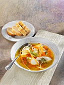 Fish soup with vegetables strips and hake dumplings
