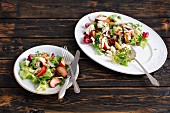 A colourful salad with plums and mozzarella