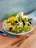 Fruit salad with chicory, fennel, cheese and walnuts