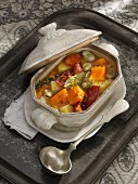 Pumpkin stew with broad beans, potatoes and bacon