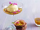 Pineapple sorbet with passion fruit sauce and sage flowers