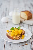 French toast with almond bread, fruit and lemon balm
