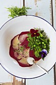 Beetroot carpaccio with herbs