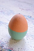 Easter egg half painted mint green
