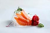 Salmon sashimi with bean sprouts and wasabi