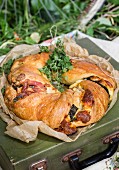 A savoury bread wreath for a picnic
