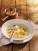 Festive cauliflower soup with flaked almonds
