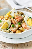 Kedgeree with salmon and boiled eggs (Great Britain)