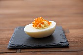 A devilled egg filled with caviar