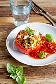Stuffed peppers with minced beef, tender wheat, root vegetables and feta cheese