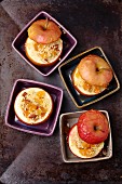 Baked apples with millet, dried apricots, almonds and honey